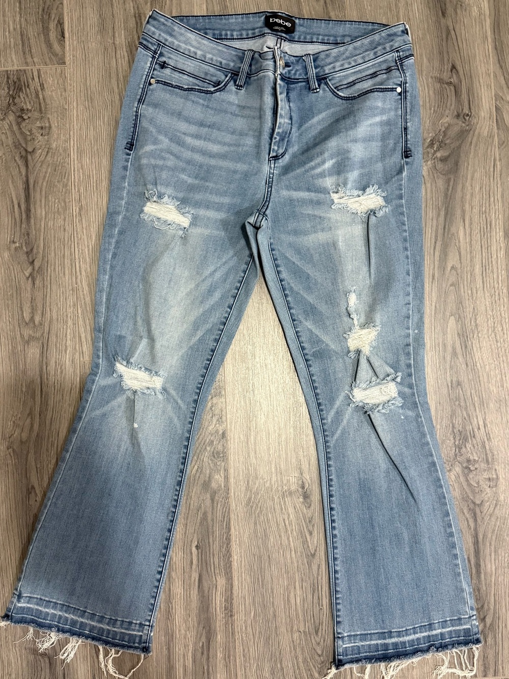 bebe Light Blue Distressed Flare Jeans
